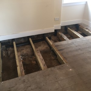 New joist sections fitted to rear room centre
